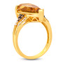 side view of elongated pear citrine white and brown diamond ring in 14k yellow gold