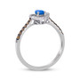 side view of dainty sapphire white and brown diamond halo ring in 14k white gold