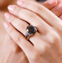 chocolate sapphire rhodolite and zircon ring in 18k yellow gold over sterling silver worn on a hand