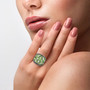 chrome diopside black spinel and white zircon wide cluster band ring in rhodium over sterling silver worn on a hand