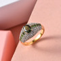 chrome tourmaline and white zircon ring in 18k yellow gold and rhodium over sterling silver shown in a lifestyle photo