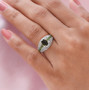 chrome tourmaline and white zircon ring in 18k yellow gold and rhodium over sterling silver worn on a hand