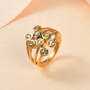 chrysoberyl openwork bubble ring in 18k yellow gold over sterling silver shown in a lifestyle photo