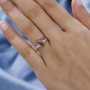 blush zircon champagne and white diamond bypass ring in 18k rose gold over sterling silver worn on a hand