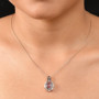 pink apatite champagne and white diamond halo necklace in 18k rose gold over sterling silver worn around the neck