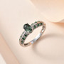 multi-color parti sapphire tsavorite and moissanite ring in rhodium over sterling silver shown in a lifestyle photo