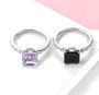 close up of garnet or rose de france amethyst and white zircon wedding ring in rhodium over 925 sterling silver