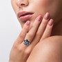 rainbow fluorite amethyst and zircon ring in rhodium over sterling silver worn on a hand