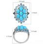 turquoise blue topaz and black spinel cluster ring in rhodium over sterling silver shown for size comparison