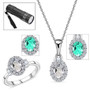hyalite opal and white zircon halo ring and pendant set showing uv reaction with included uv flashlight