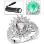 hyalite opal and moissanite oval halo ring glowing under uv flashlight showing green fluorescence front view