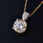 close up of strontium titanate and moissanite pendant necklace in 18k yellow gold over sterling silver