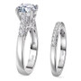 side view of 120 facet strontium titanate moissanite and sapphire bridal set in rhodium over sterling silver