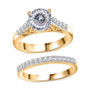 front view of 120 facet strontium titanate moissanite and sapphire bridal set in 18k yellow gold over sterling silver