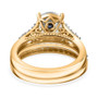 close up of 120 facet strontium titanate moissanite and sapphire bridal set in 18k yellow gold over sterling silver