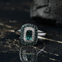 cushion cut indicolite tourmaline and moissanite double halo ring on dark background rhodium over sterling silver
