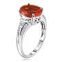 side view of mexican fire opal and diamond platinum ring with tapered baguette and round diamond accents