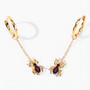open view of garnet spider dangle earrings in 18k yellow gold over sterling silver