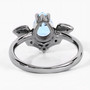 back view of aquamarine and black spinel bat ring in black rhodium over sterling silver