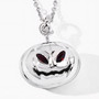 angled view 3d pumpkin pendant with red garnet eyes in rhodium plated sterling silver