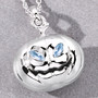 close up of 3d pumpkin sky blue topaz pendant in rhodium over sterling silver