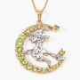flying witch and crescent moon two-tone pendant necklace with peridot and white topaz in 18k yellow gold and rhodium over sterling silver