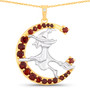 front view of flying witch and crescent moon two-tone pendant necklace with garnet and white topaz in 18k yellow gold and rhodium over sterling silver