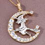 full view of flying witch and crescent moon two-tone pendant necklace with sky blue topaz and white topaz in 18k yellow gold and rhodium over sterling silver