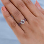 bekily color change garnet rhodolite and zircon pear halo ring in rhodium over sterling silver shown for size comparison