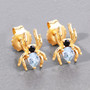 spider stud earrings with sky blue topaz and black spinel in 18k yellow gold over sterling silver