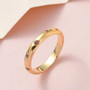 side view of orange diamond flush set band ring in 18k yellow gold over sterling silver