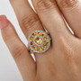 heliodor and white zircon double halo ring in 18k yellow gold and rhodium over sterling silver shown for size comparison