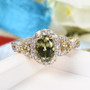 demantoid garnet and white zircon halo infinity shank ring in 18k yellow gold over sterling silver
