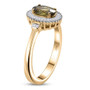 side view of demantoid garnet and diamond oval halo ring in 10k yellow gold