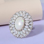 australian white opal and moissanite halo ring in rhodium over solid 925 sterling silver shown in a lifestyle photo