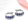 full view of iolite hoop earrings in rhodium over sterling silver