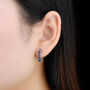 iolite hoop earrings in rhodium over sterling silver worn on the ear