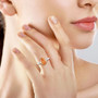 imperial topaz and diamond ring in 950 platinum worn on a hand