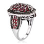 side view of anthill garnet oval and black spinel ring in black and white rhodium over 925 sterling silver