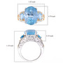 sky blue topaz trilogy ring in 18k yellow gold and rhodium over 925 sterling silver shown for size comparison