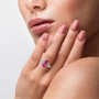 pink topaz and white zircon pear ring in rhodium over sterling silver shown for size comparison