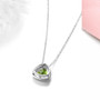 back view of peridot and white zircon trillion halo necklace in rhodium over sterling silver