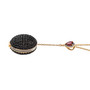 side view of convertible black spinel and rhodolite garnet necklace in 18k yellow gold over sterling silver
