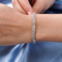 goshenite round tennis bracelet in rhodium over sterling silver shown in a lifestyle photo
