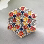 multi-color sapphire cluster ring in rhodium and 18k yellow gold over silver