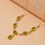 peridot and mother of pearl floral necklace in 18k yellow gold over silver