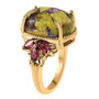 side view of atlantisite and cabochon rhodolite garnet ring in 18k yellow gold over sterling silver