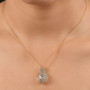 turkish diaspore pendant necklace with yellow sapphire and moissanite in two-tone 18k yellow gold and rhodium over sterling silver shown for size comparison