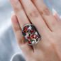 fire opal black spinel and zircon cluster ring in 18k yellow gold and rhodium over sterling silver shown for size comparison