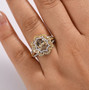 turkish diaspore ring with yellow sapphire and moissanite in two-tone 18k yellow gold and rhodium over sterling silver worn on a hand